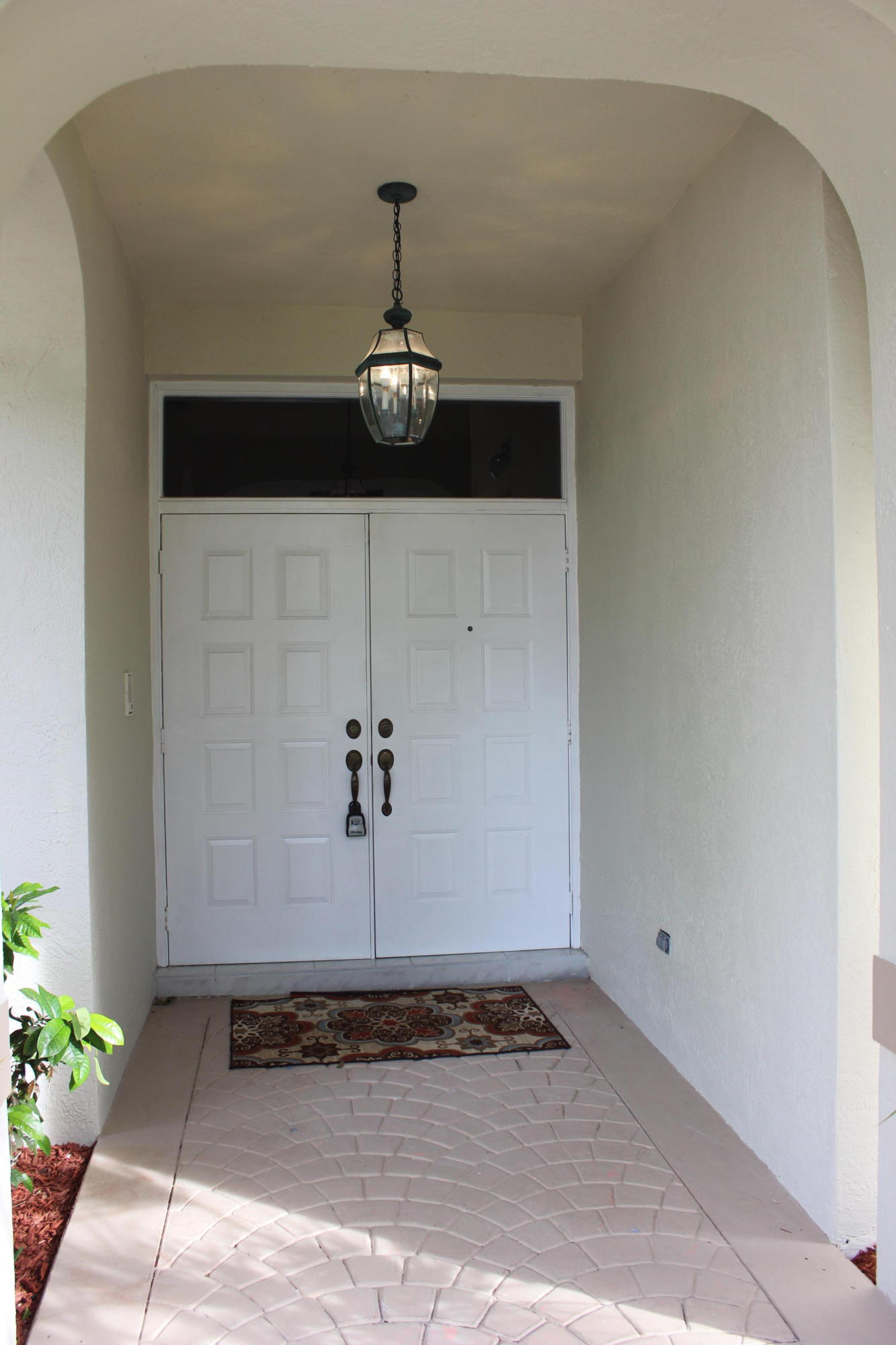2671 Northwest 49th Street Boca Raton, FL 33434 - Photo 5 of 47 a view of entryway