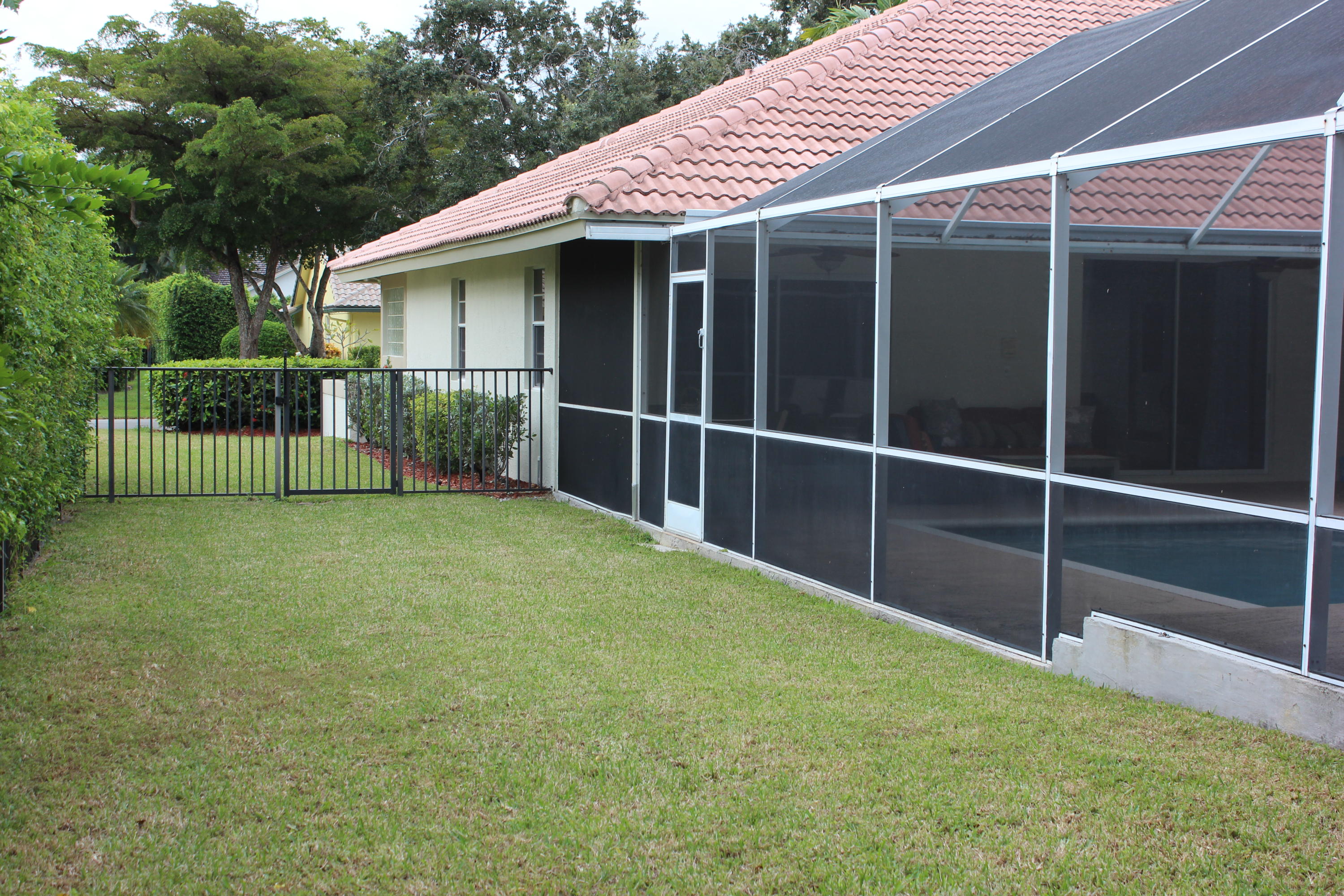 2671 Northwest 49th Street Boca Raton, FL 33434 - Photo 6 of 47 a view of backyard with green space
