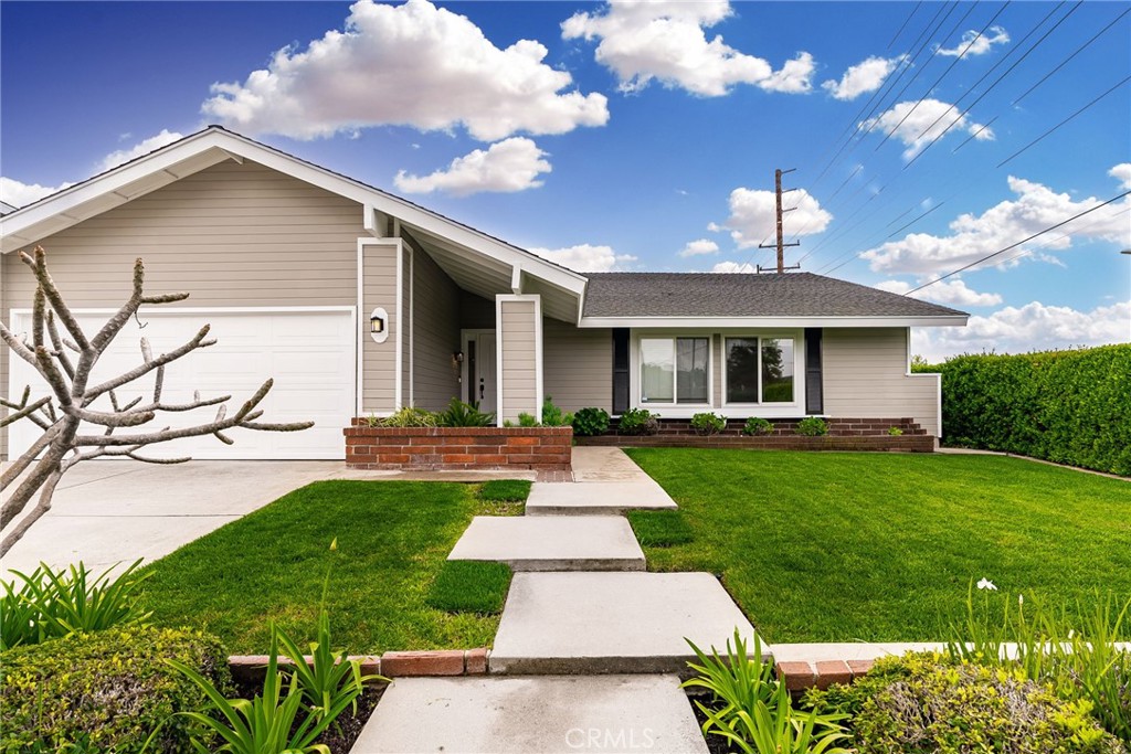 1902 East Eucalyptus Lane Brea, CA 92821 - Photo 1 of 41 a front view of a house with garden