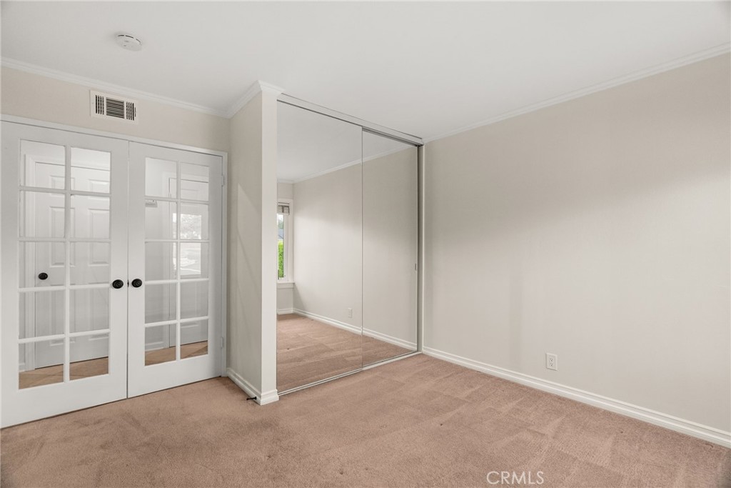 1902 East Eucalyptus Lane Brea, CA 92821 - Photo 23 of 41 an empty room with windows and closet
