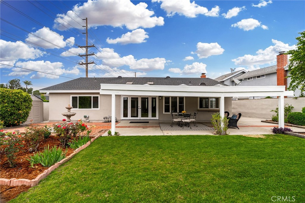 1902 East Eucalyptus Lane Brea, CA 92821 - Photo 31 of 41 a view of a house with backyard sitting area and garden