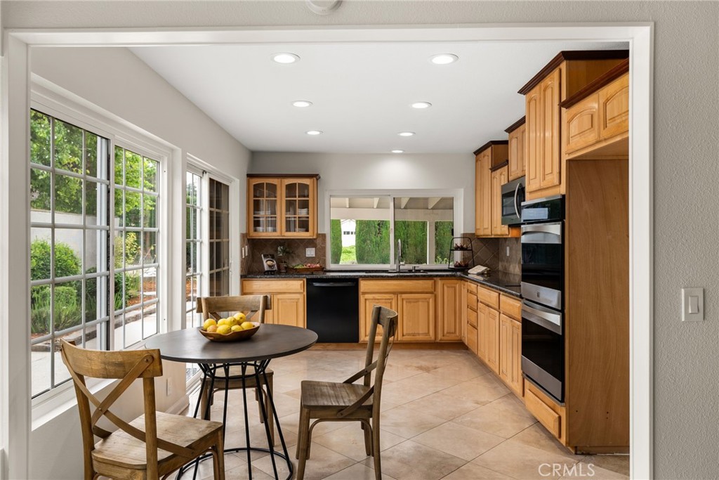 1902 East Eucalyptus Lane Brea, CA 92821 - Photo 7 of 41 a kitchen with a table and chairs in it