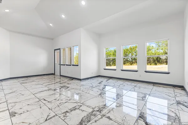 a view of an empty room and window