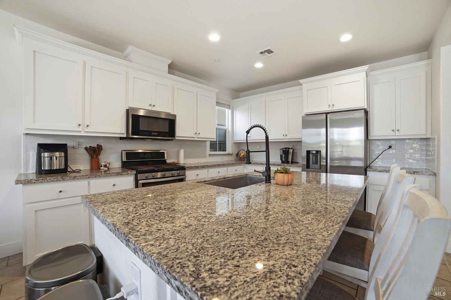 5305 Kirby Place Rohnert Park, CA 94928 - Photo 8 of 37 a kitchen with sink a microwave and cabinets