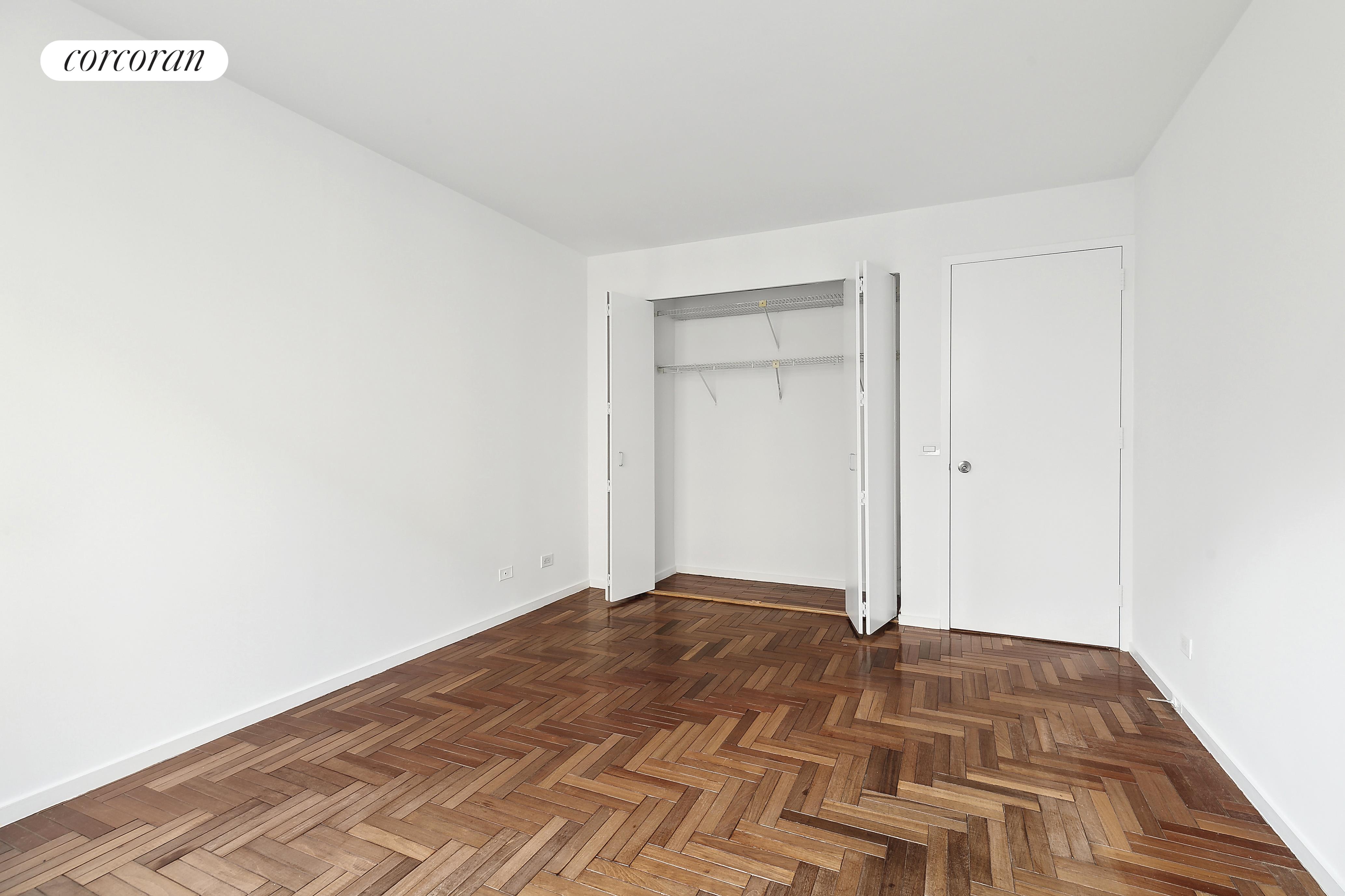 2373 Broadway, Unit 705 Manhattan, NY 10024 - Photo 11 of 13 a view of a big room with wooden floor