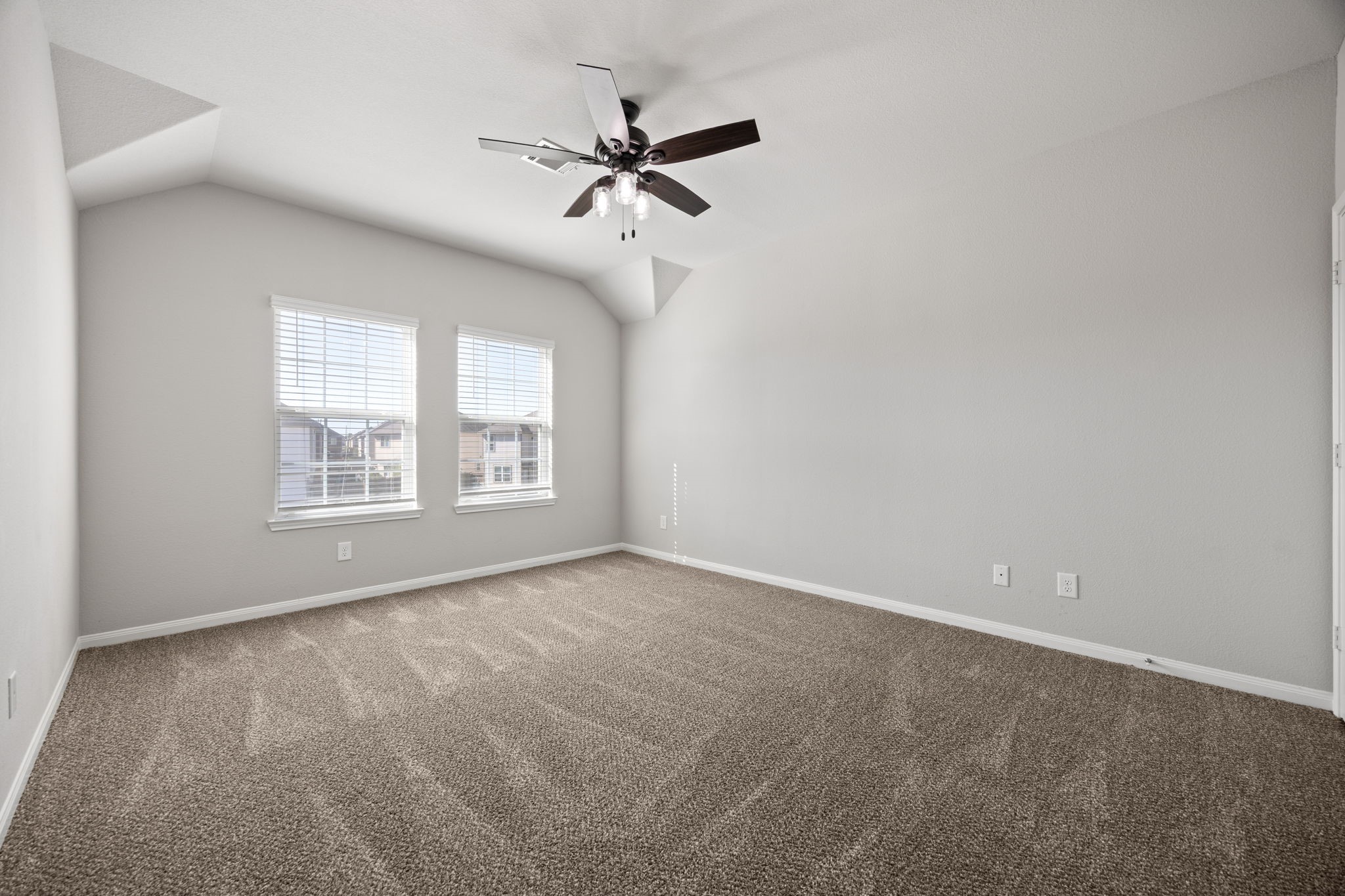 18606 Lansdowne Stream Path Katy, TX 77449 - Photo 32 of 39 a view of an empty room with a window