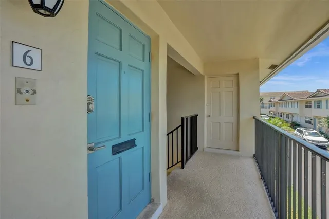 a view of hallway with washer and dryer