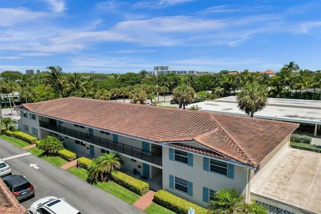 a view of a living room and kitchen