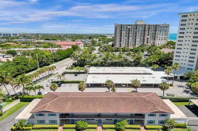 a view of building with yard