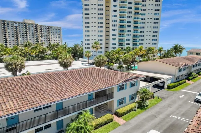 a view of swimming pool with outdoor seating
