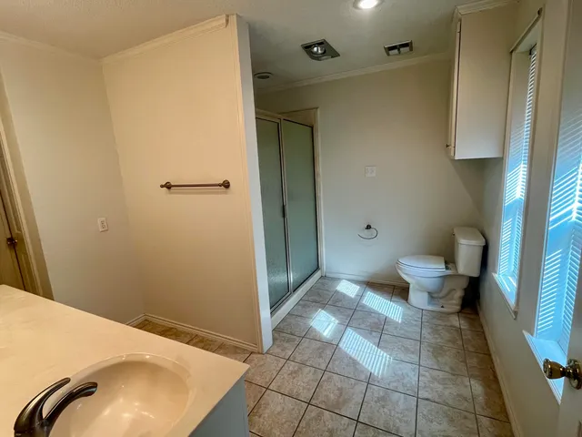 a bathroom with a sink and toilet