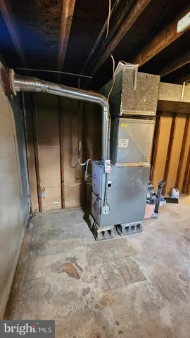 a view of a room with wooden walls