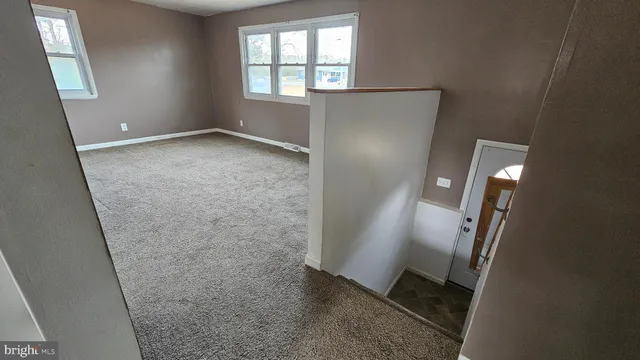 an empty room with windows