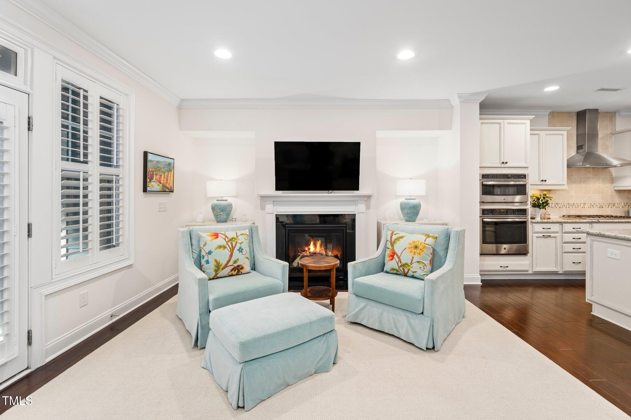 512 Fallon Grove Way Raleigh, NC 27608 - Photo 7 of 34 Living Room with Gas Fireplace