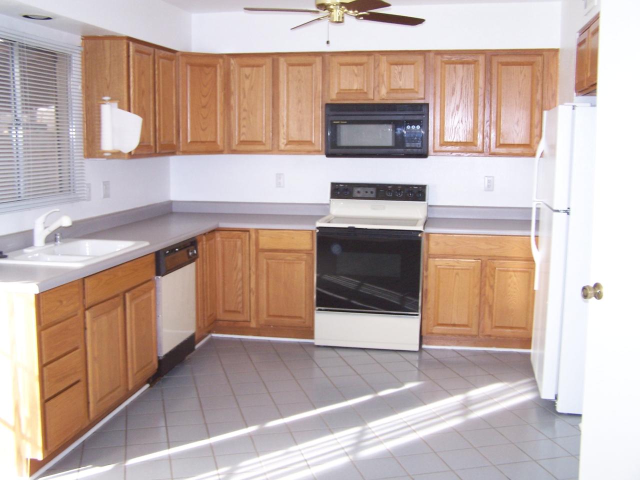 6625 South La Rosa Drive Tempe, AZ 85283 - Photo 2 of 9 REMODELED KITCHEN W/OAK CABINETS
