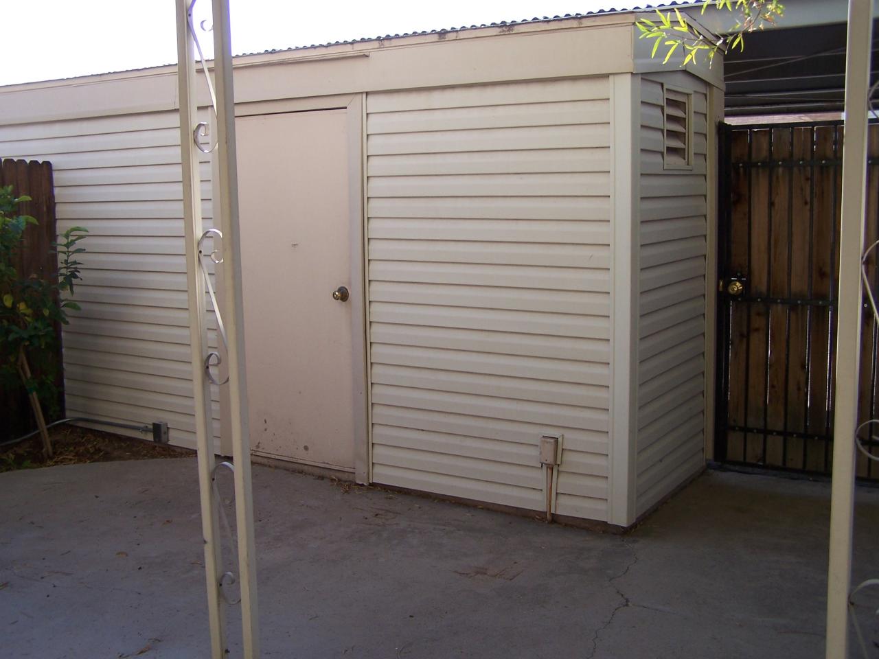 6625 South La Rosa Drive Tempe, AZ 85283 - Photo 9 of 9 STORAGE AREA OFF PATIO W/REAR PARKING