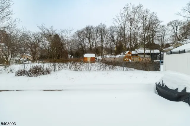 a view of street with parked cars