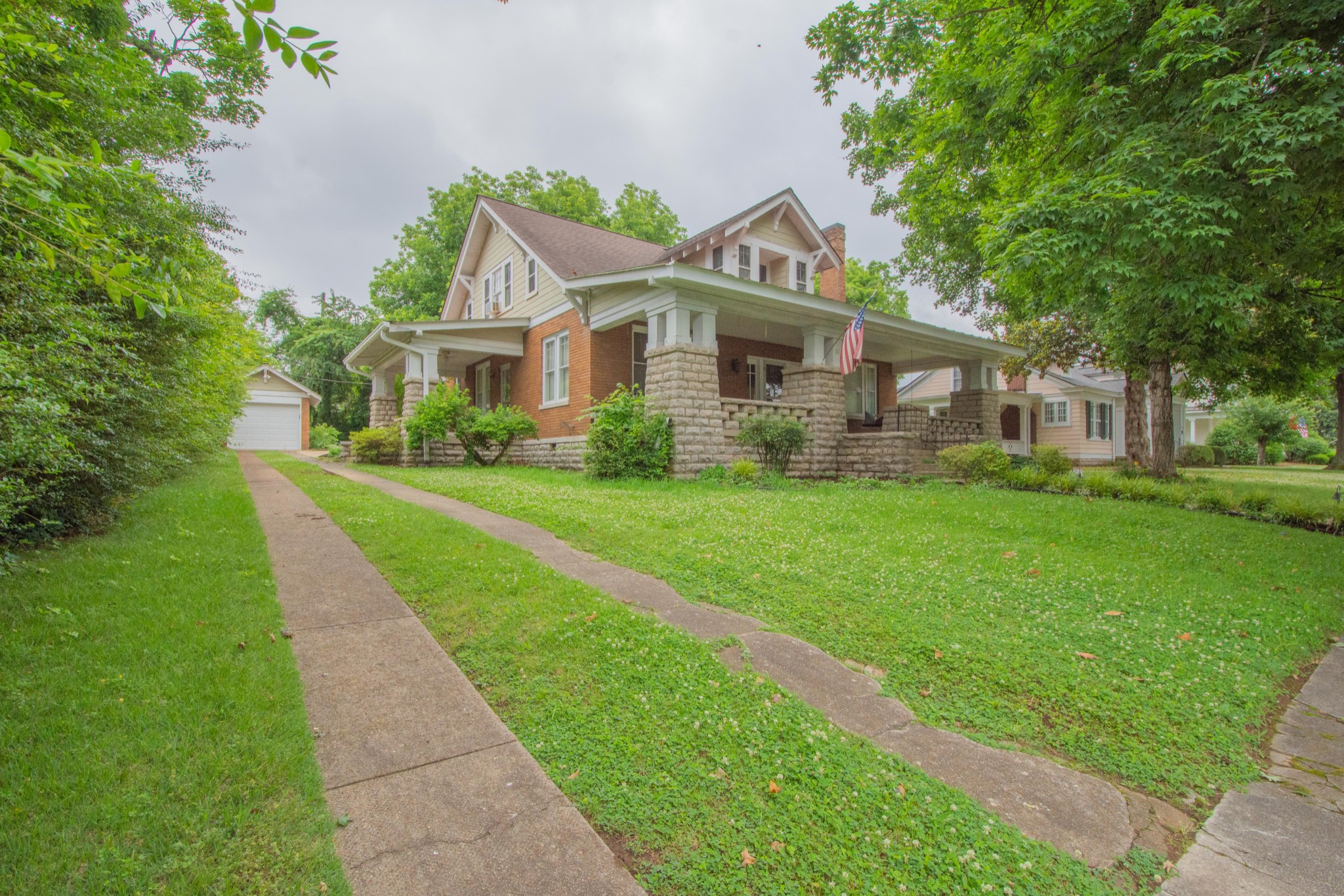 311 South 3rd Street Pulaski, TN 38478 - Photo 1 of 44 a front view of house with yard and green space
