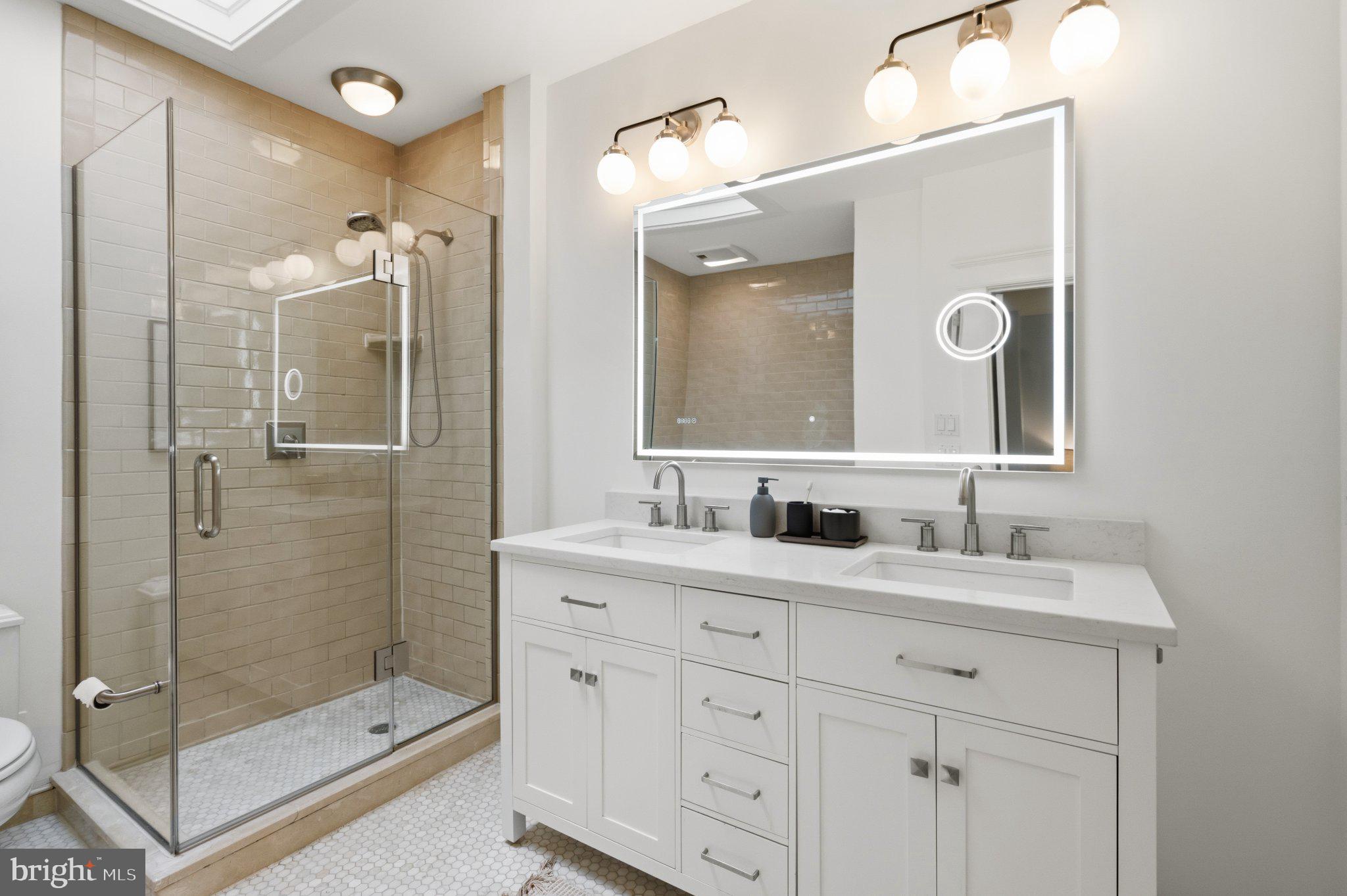 2934 Porter Street Northwest Washington, DC 20008 - Photo 20 of 33 Sleek modern bathroom oasis.