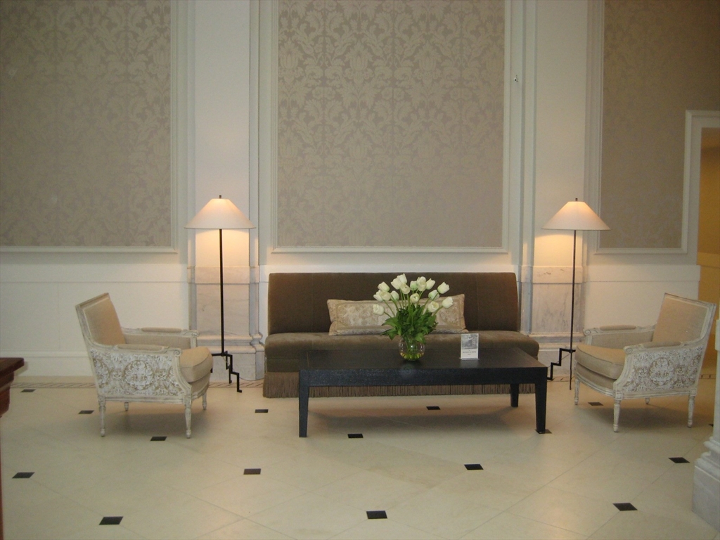 21 Beacon Street, Unit 10C Boston, MA 02108 - Photo 20 of 20 a living room with furniture and a lamp