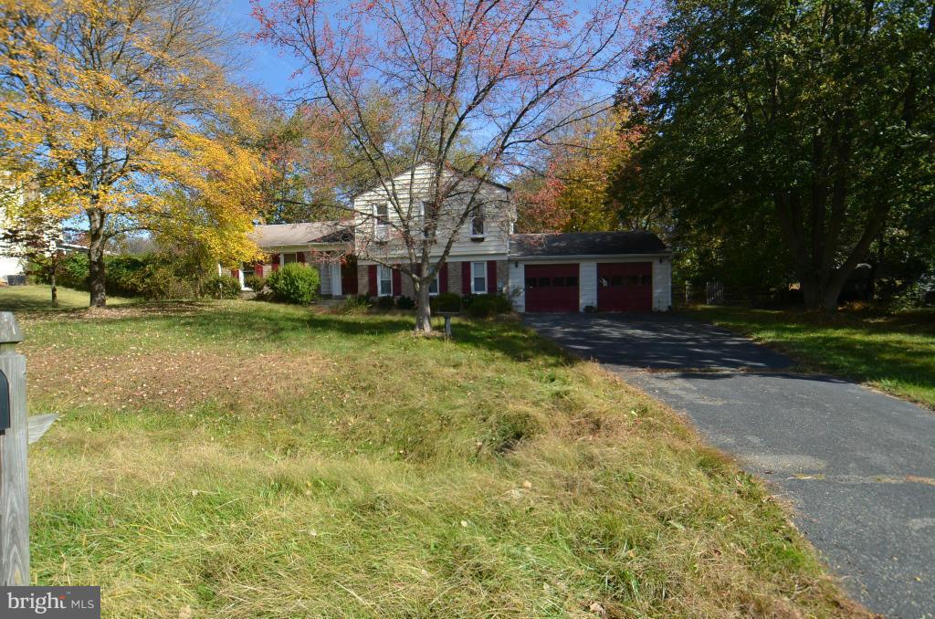 6711 Garrett Road Derwood, MD 20855 - Photo 2 of 21 a front view of a house with a yard
