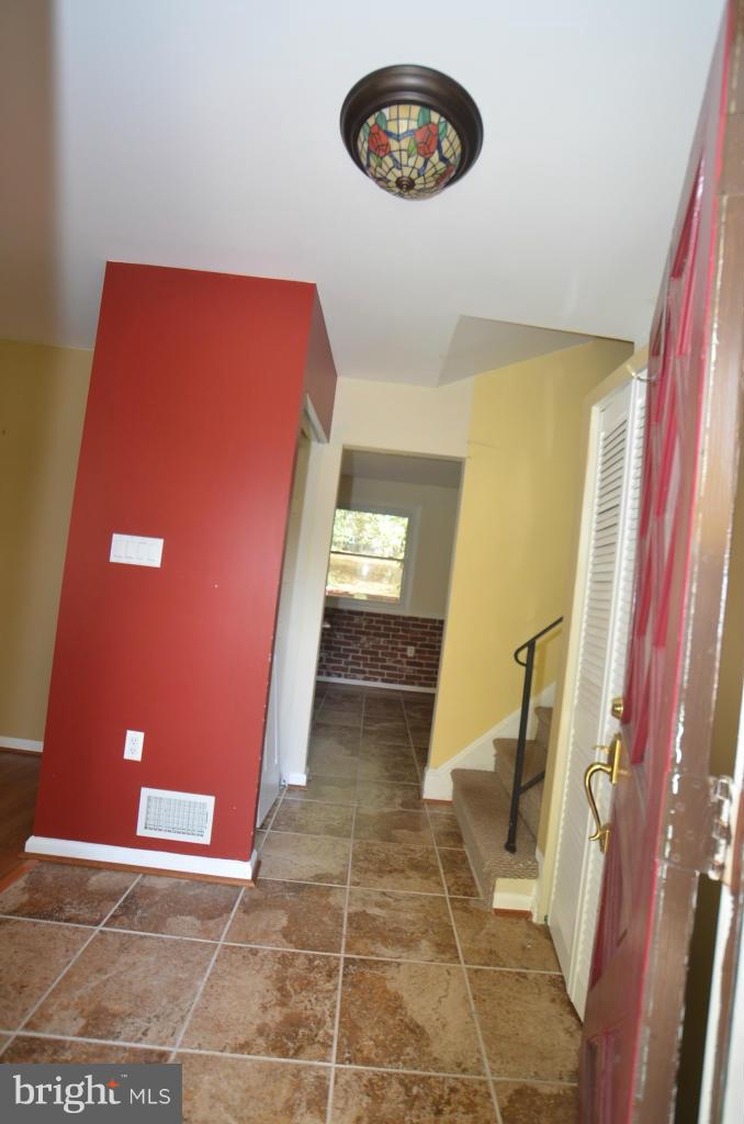 6711 Garrett Road Derwood, MD 20855 - Photo 11 of 21 a view of an empty room with a door