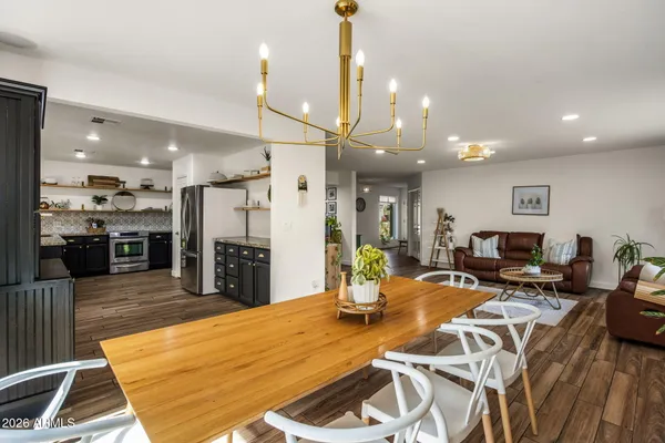 a view of a dining room with furniture