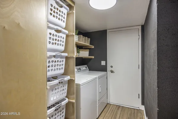 a utility room with dryer and washer