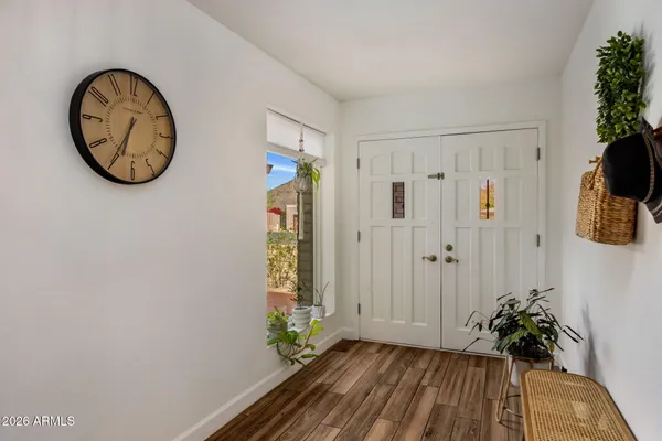 a view of a hallway with entryway