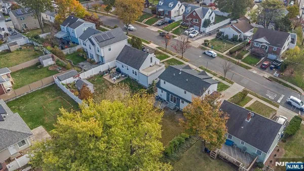 an aerial view of a house with a garden