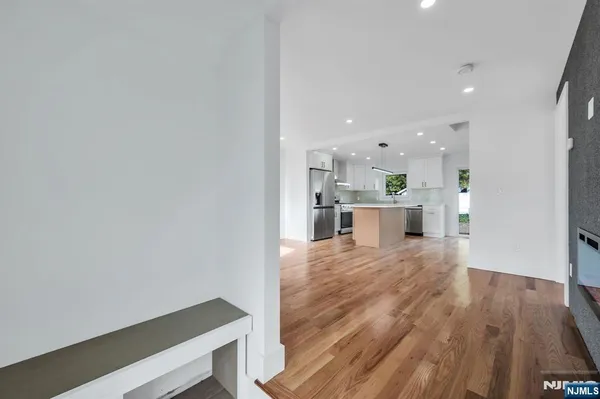 a view of kitchen and wooden floor