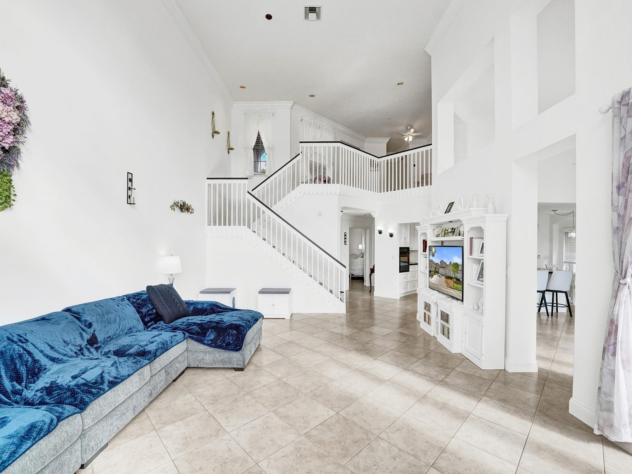 6298 Brava Way Boca Raton, FL 33433 - Photo 24 of 91 a living room with furniture and wooden floor