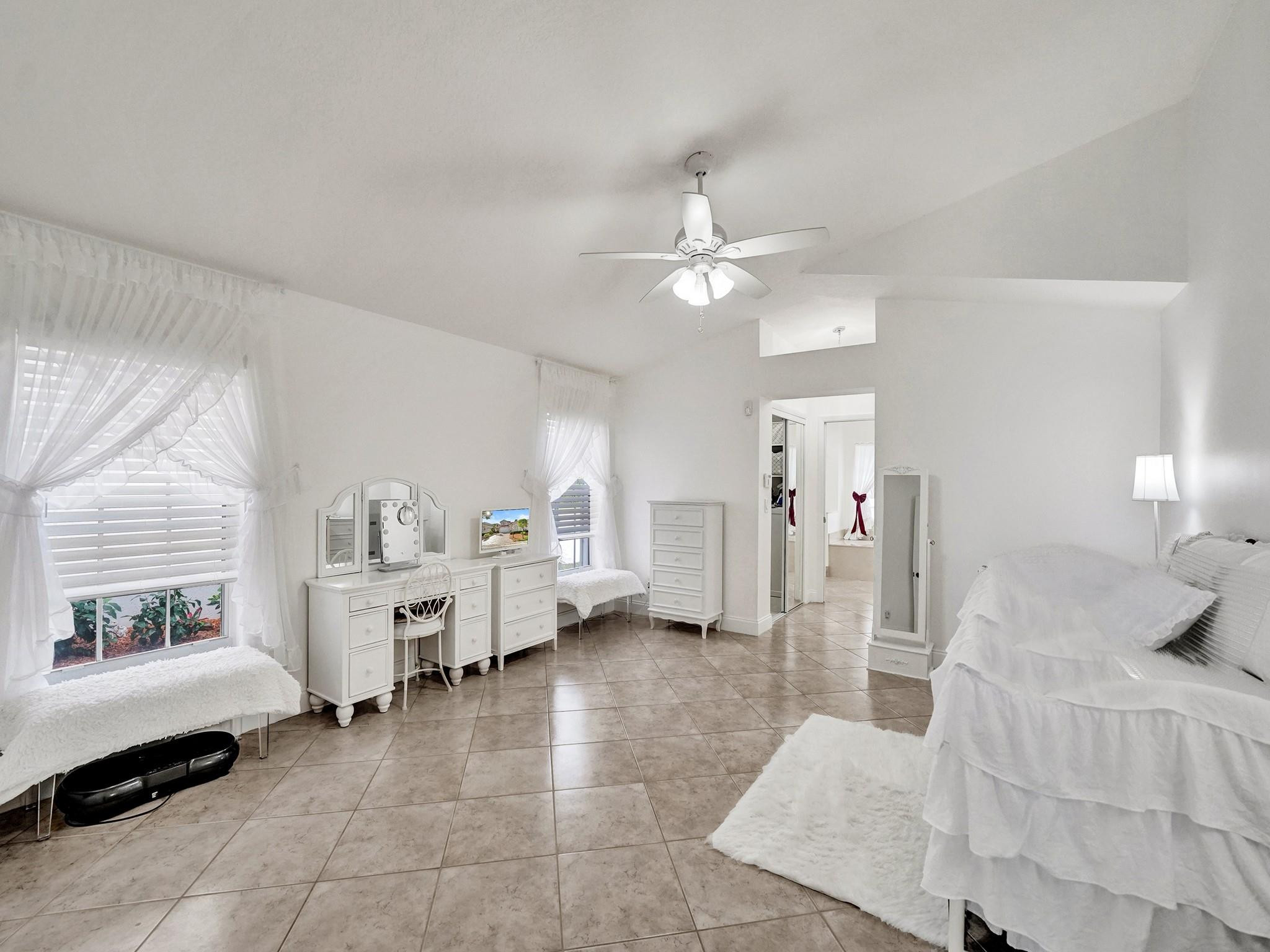 6298 Brava Way Boca Raton, FL 33433 - Photo 44 of 91 a living room with furniture and white walls