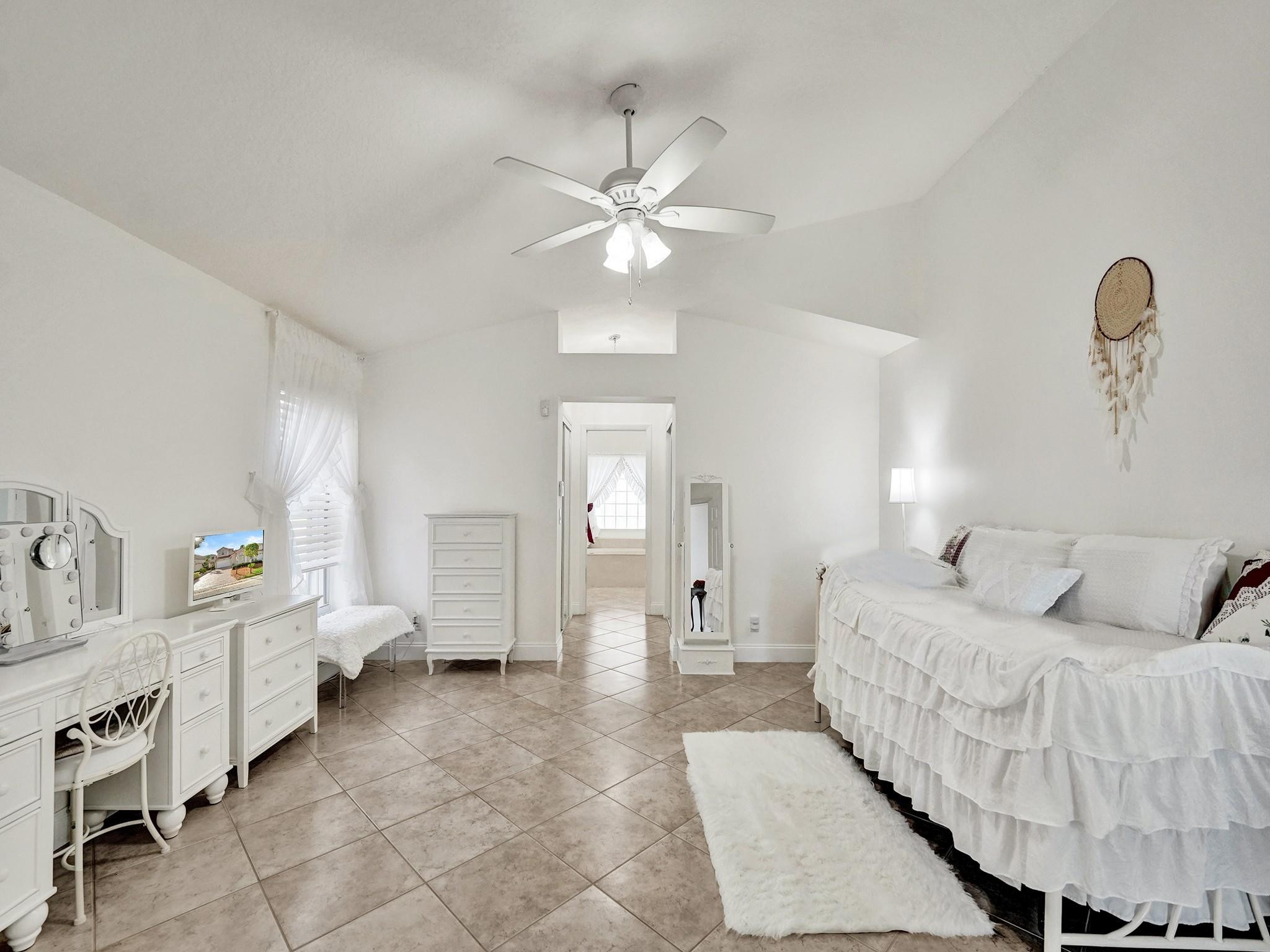 6298 Brava Way Boca Raton, FL 33433 - Photo 45 of 91 a living room with furniture and a chandelier