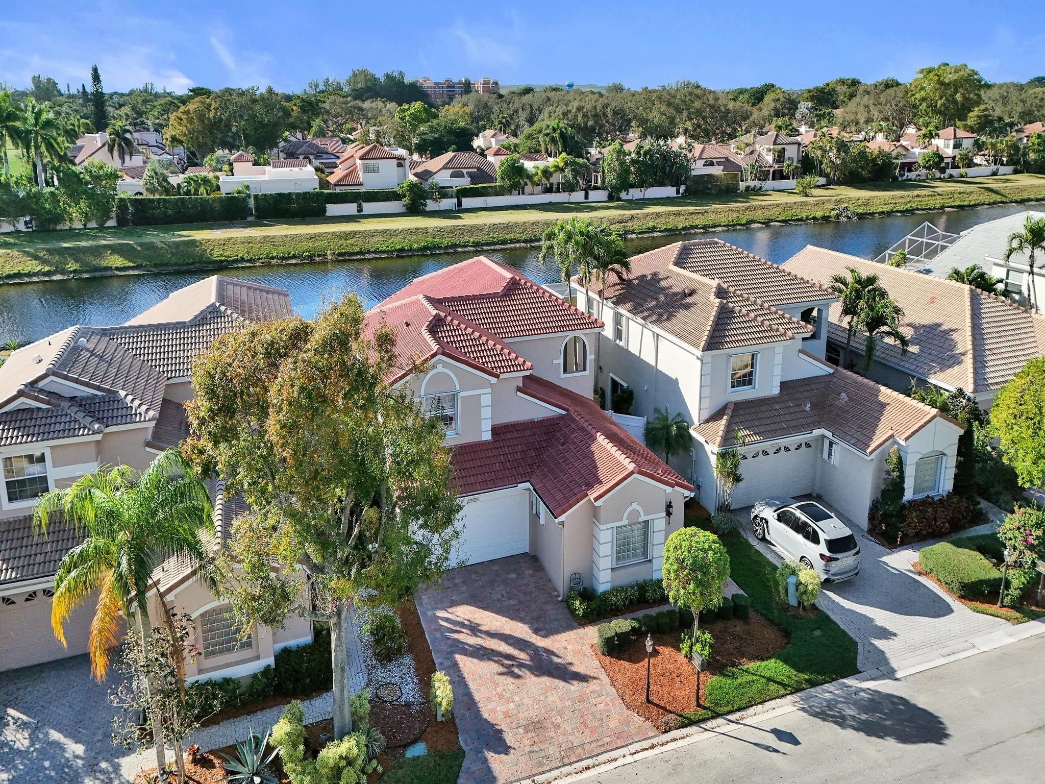 6298 Brava Way Boca Raton, FL 33433 - Photo 6 of 91 an aerial view of a house with outdoor space and lake view