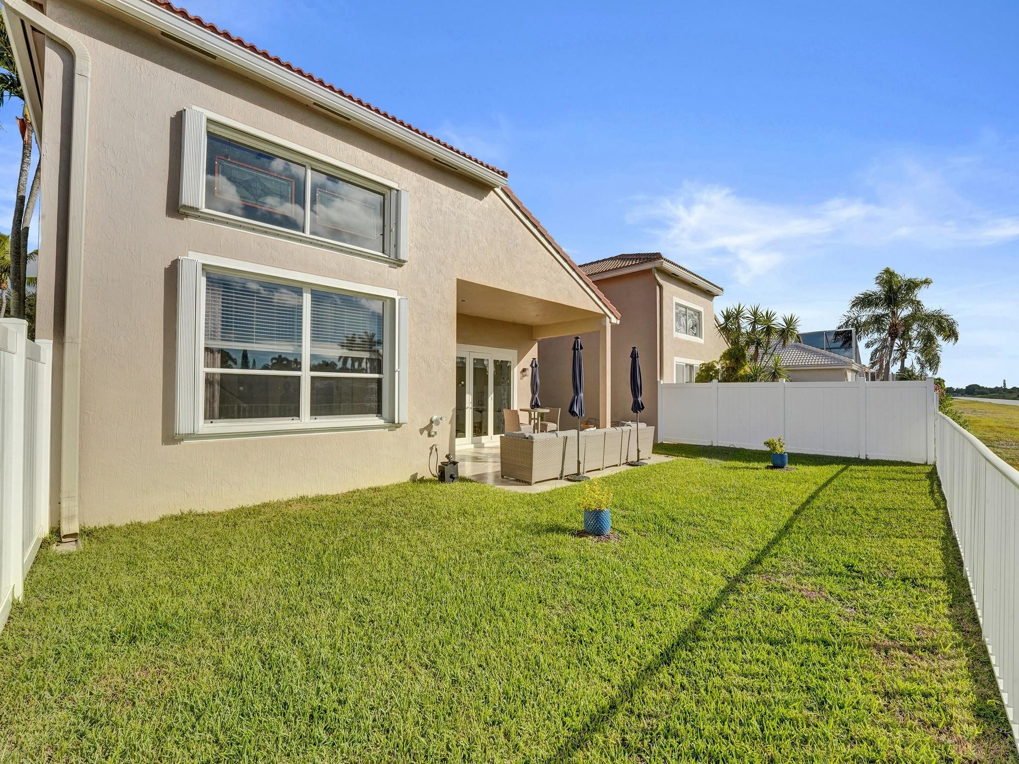 6298 Brava Way Boca Raton, FL 33433 - Photo 74 of 91 a view of house and yard with swimming pool