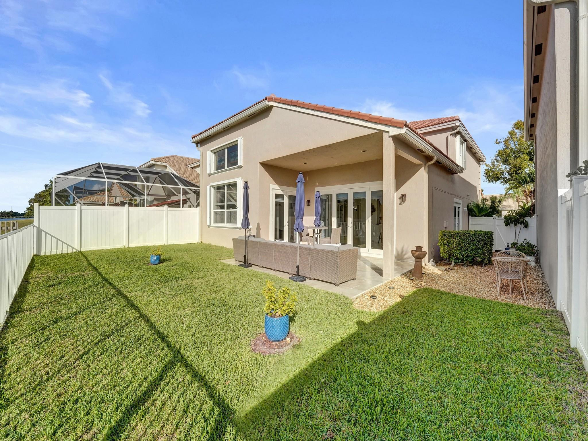 6298 Brava Way Boca Raton, FL 33433 - Photo 76 of 91 a view of a house with a backyard