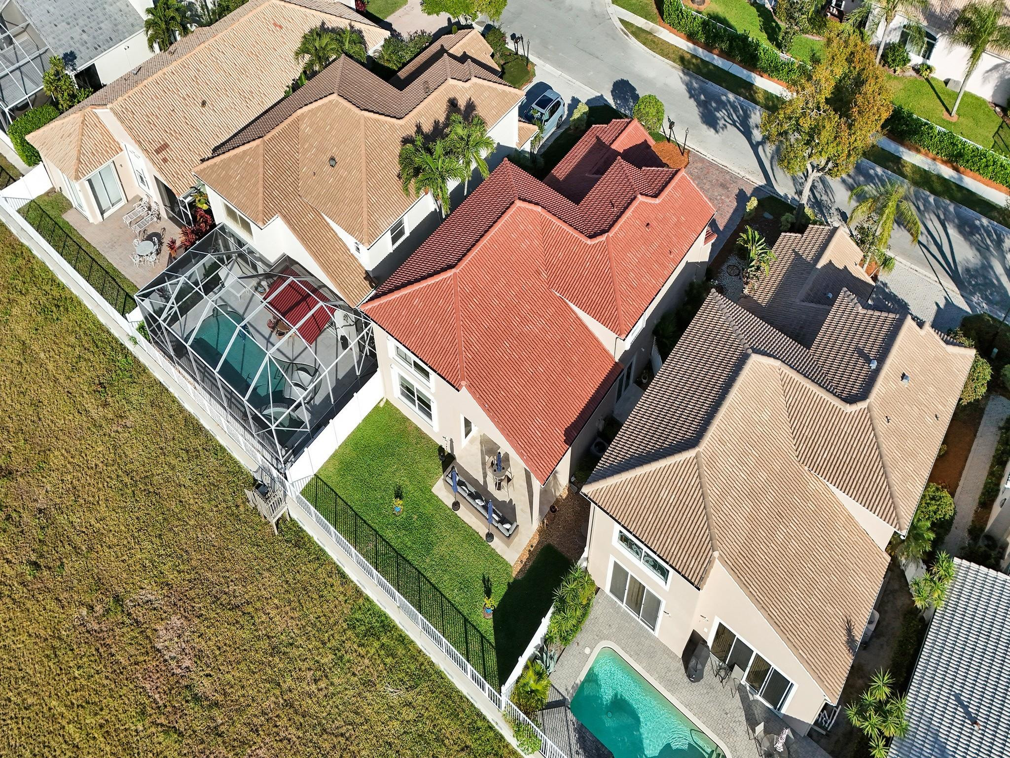 6298 Brava Way Boca Raton, FL 33433 - Photo 80 of 91 an aerial view of a house with a yard