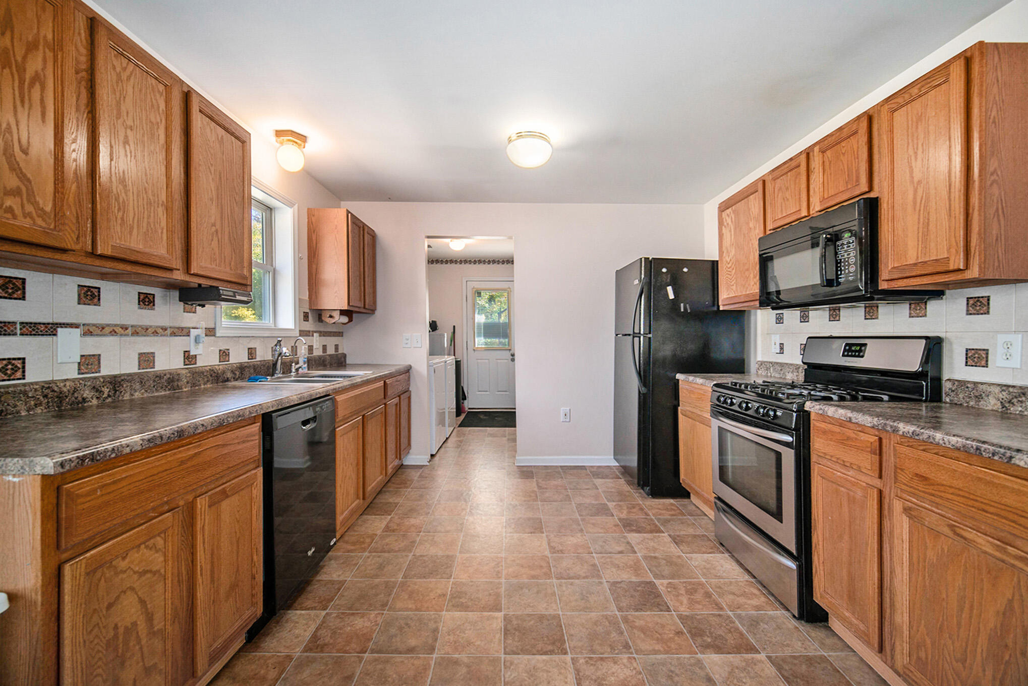 390 Ambs Road Michigan Center, MI 49254 - Photo 2 of 35 Kitchen w/ laundry access