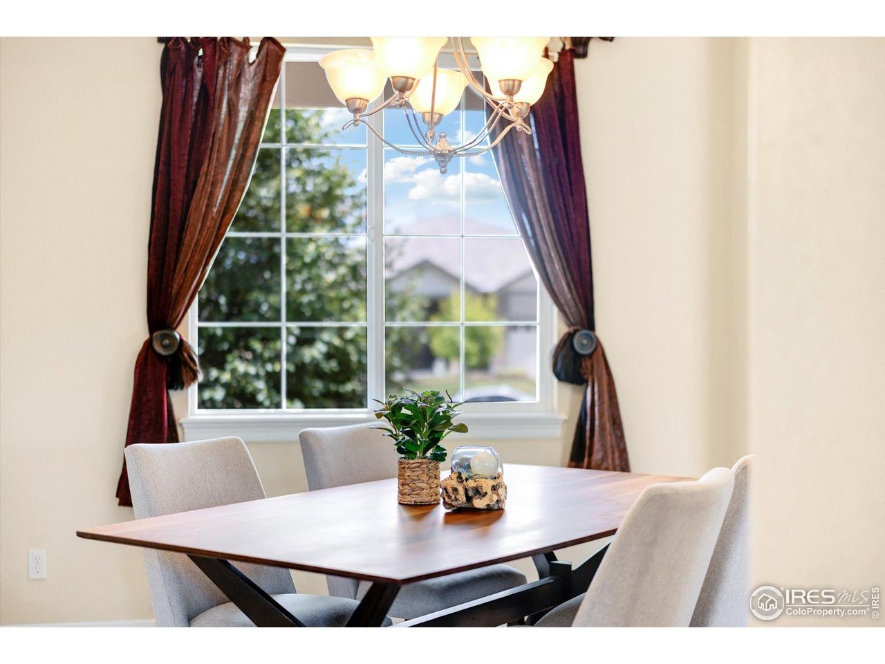 16836 Roberts Street Mead, CO 80542 - Photo 14 of 27 a view of a dining room with furniture and window