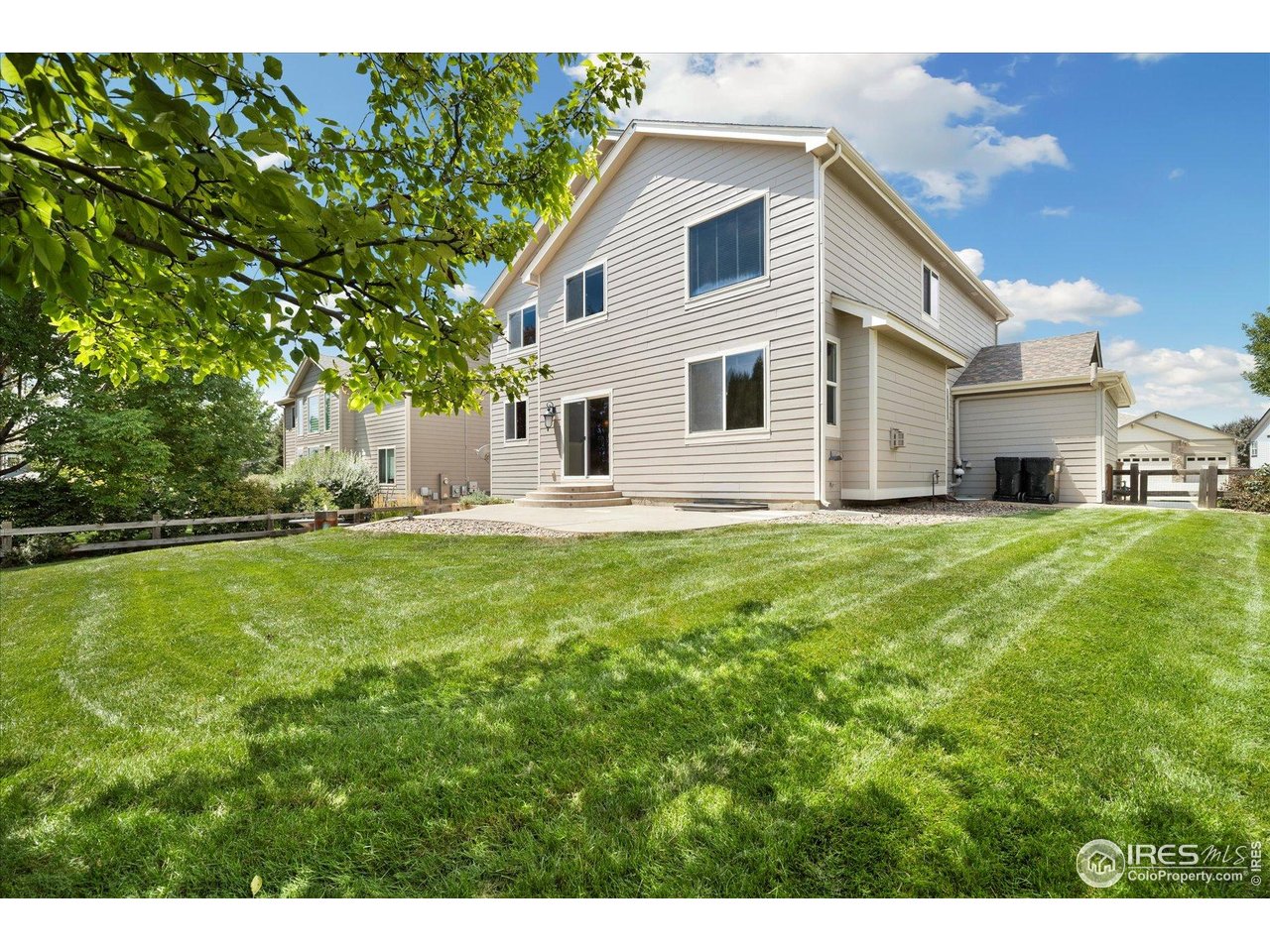 16836 Roberts Street Mead, CO 80542 - Photo 18 of 27 a view of a house with a yard