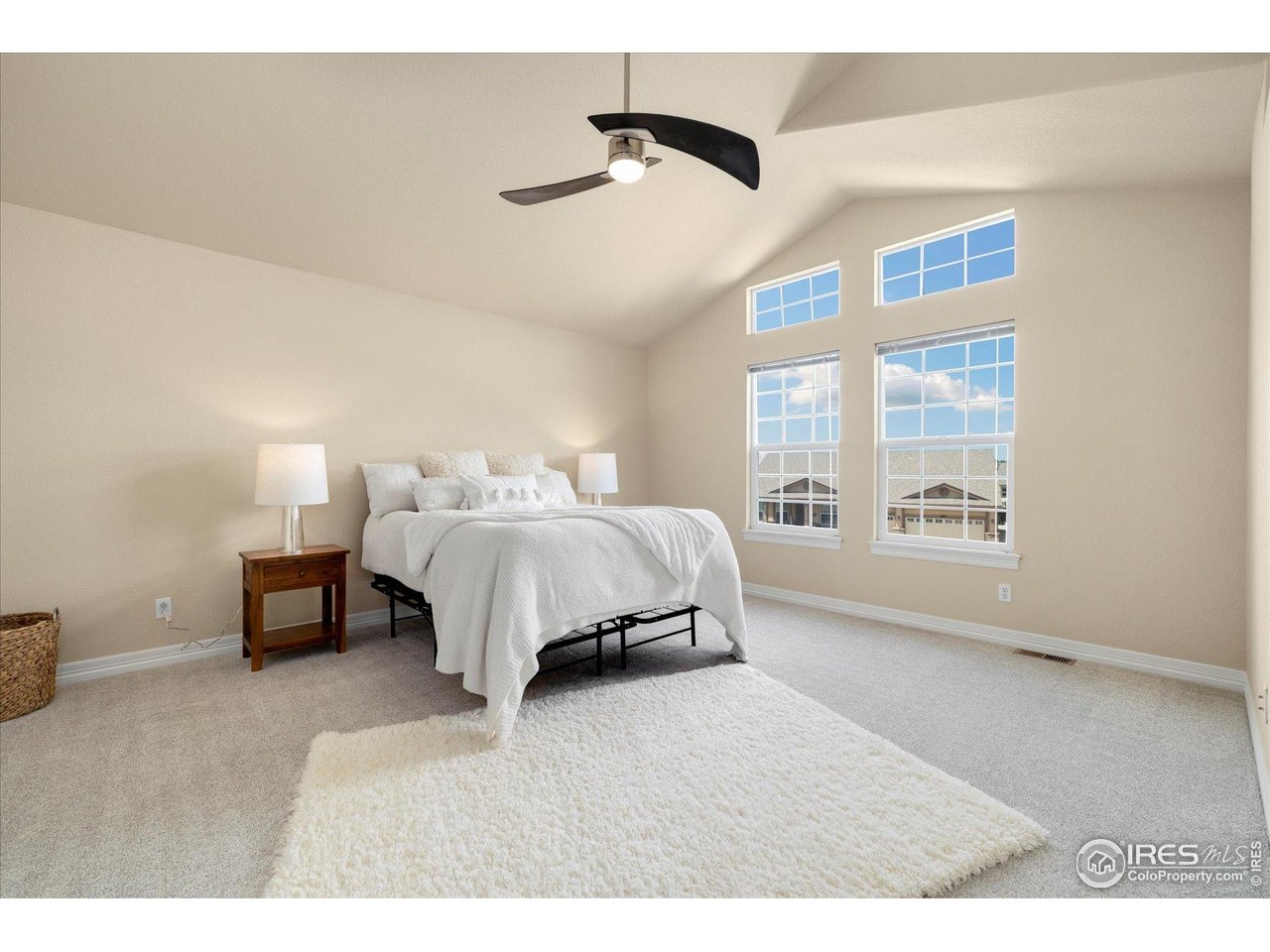16836 Roberts Street Mead, CO 80542 - Photo 19 of 27 a bedroom with a bed and window
