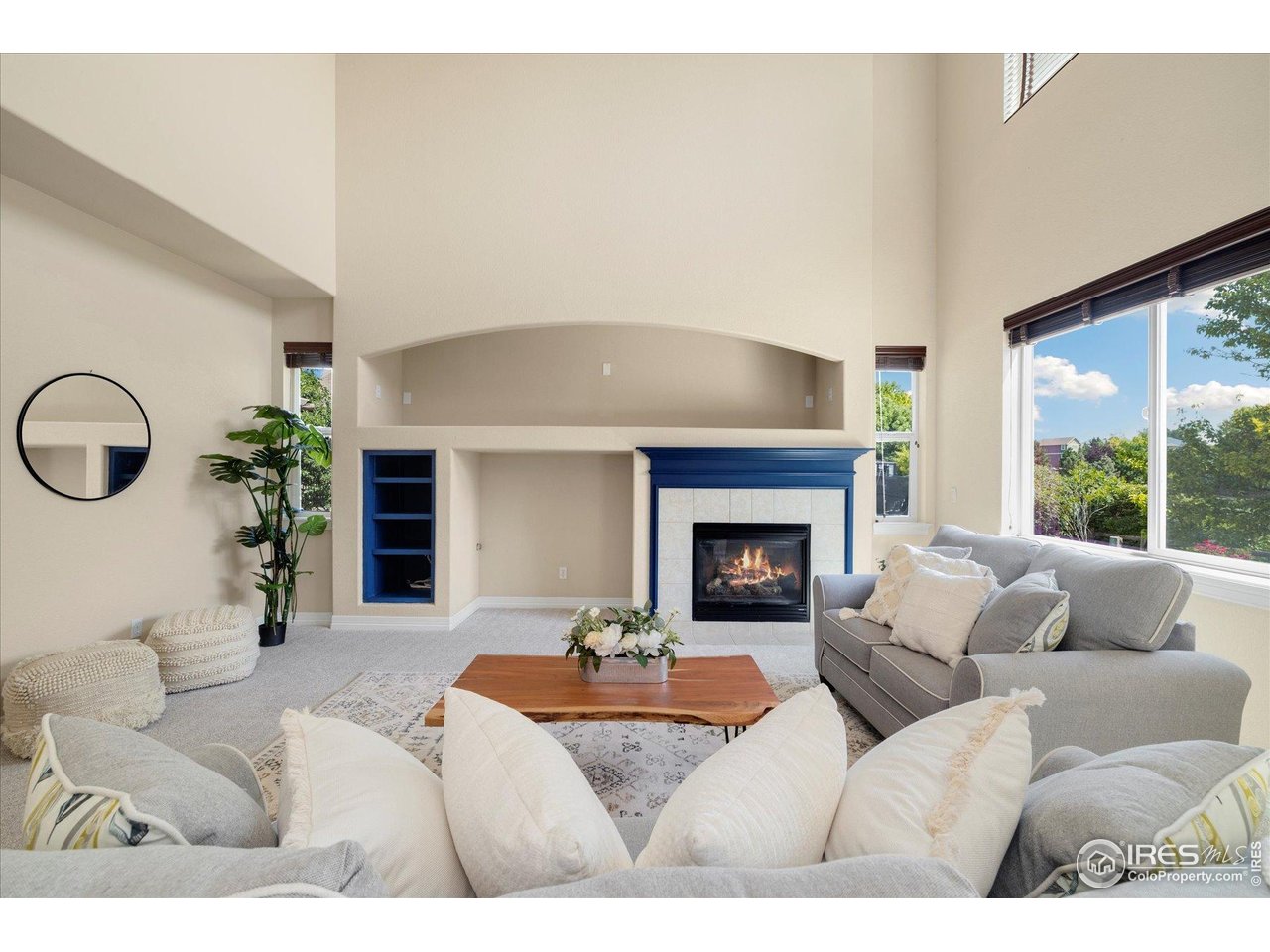 16836 Roberts Street Mead, CO 80542 - Photo 6 of 27 a living room with furniture and a fireplace