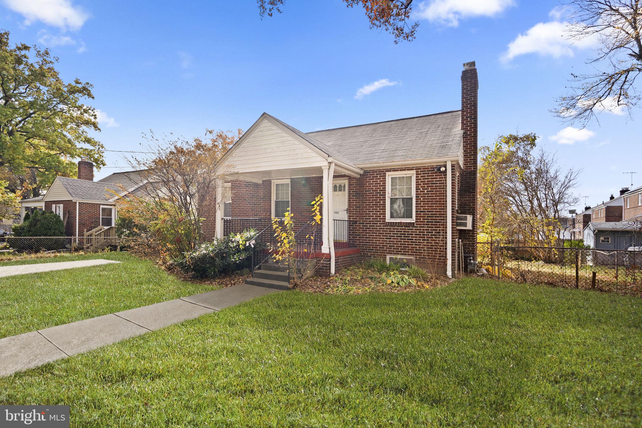 3403 Lancer Drive Hyattsville, MD 20782 - Photo 2 of 24 a view of a house with a yard and pathway