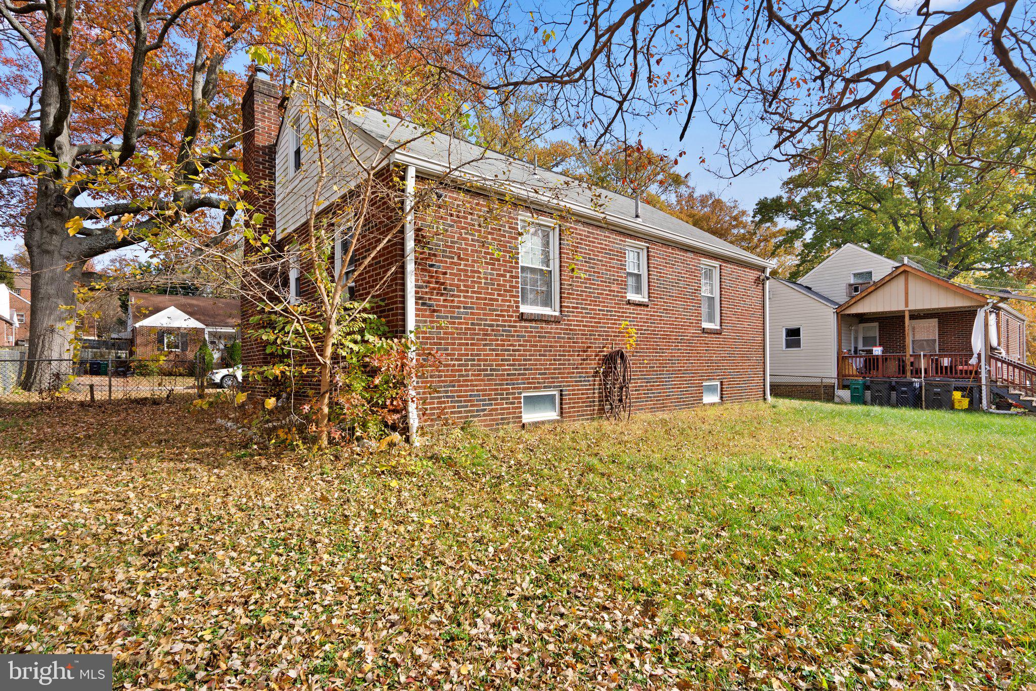 3403 Lancer Drive Hyattsville, MD 20782 - Photo 22 of 24 a front view of a house with a yard