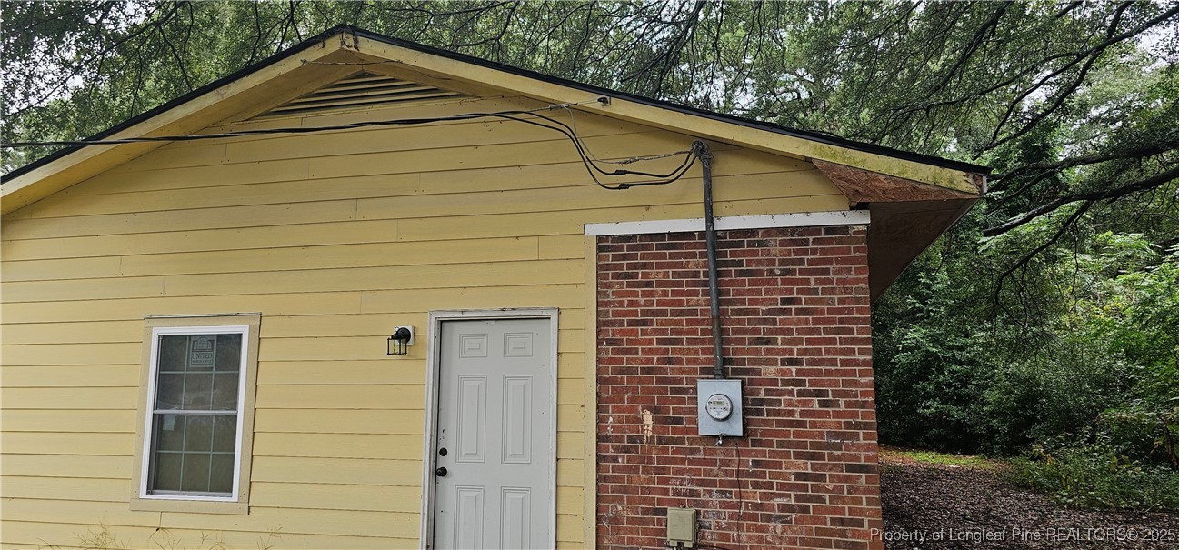 2763 Blossom Road Hope Mills, NC 28348 - Photo 2 of 2 a side view of a house