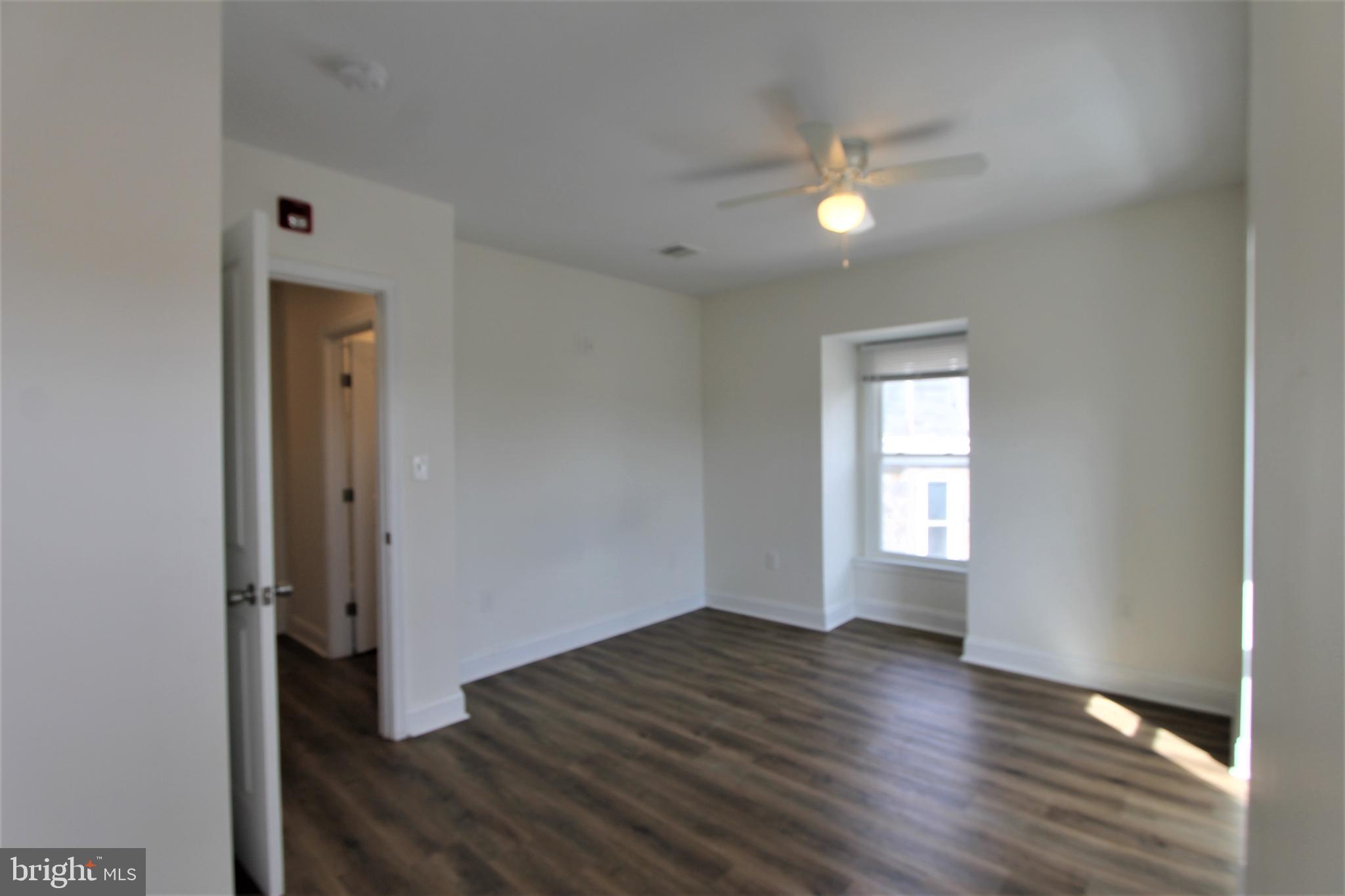 204 High Street Philadelphia, PA 19144 - Photo 19 of 19 a view of empty room with wooden floor
