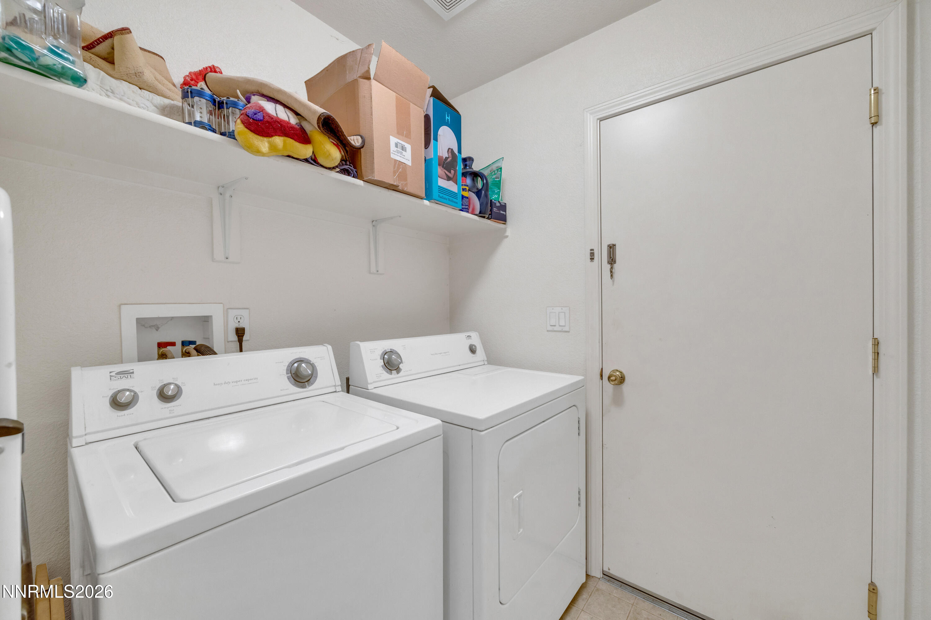 17391 Desert Lake Drive Reno, NV 89508 - Photo 22 of 39 a utility room with dryer and washer