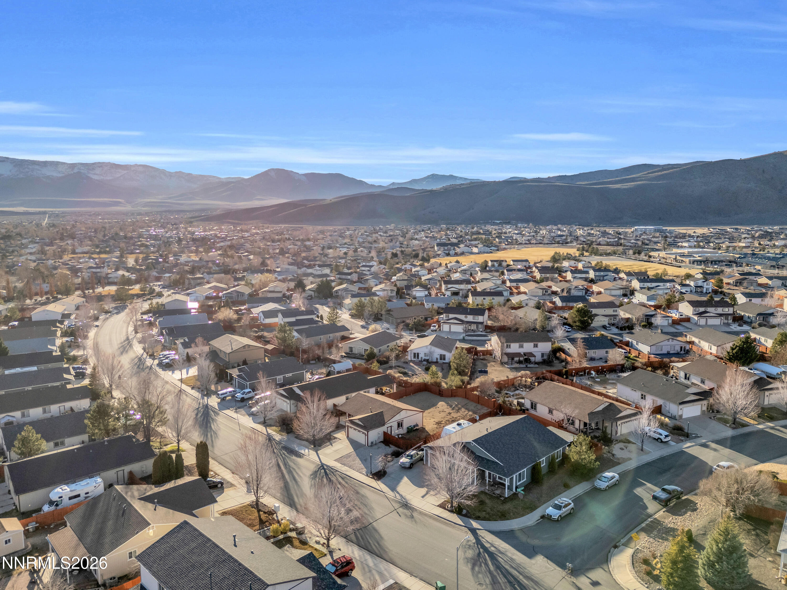 17391 Desert Lake Drive Reno, NV 89508 - Photo 31 of 39 an aerial view of residential houses with city view