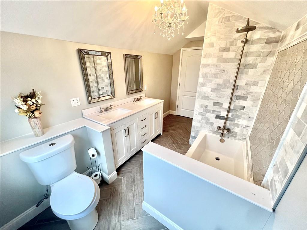 375 Old Rt 21 Road McClellandtown, PA 15458 - Photo 29 of 39 a bathroom with a sink mirror toilet and bathtub